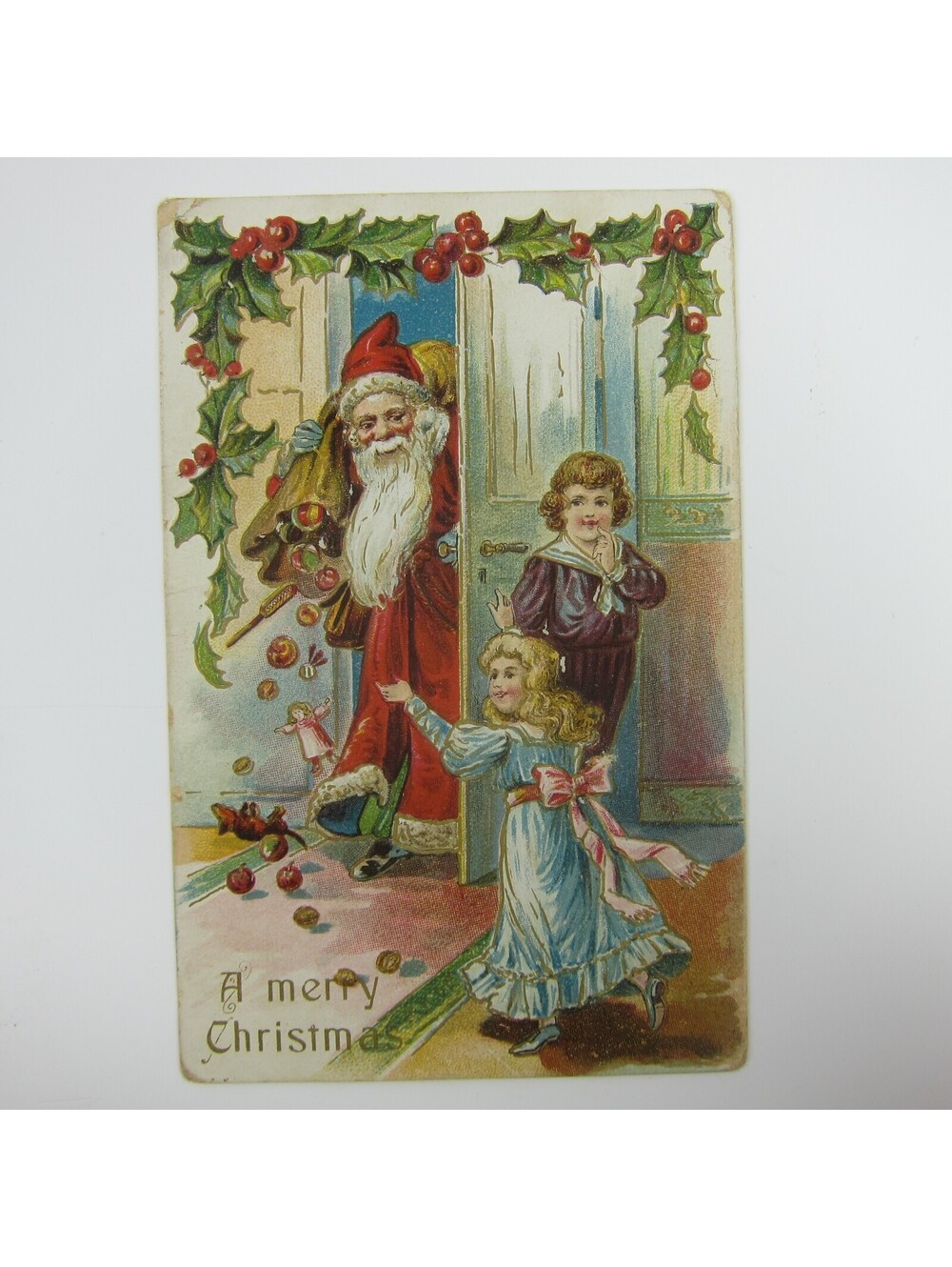 Christmas Postcard Old World Santa Bag Toys Boy Girl Holly Embossed Antique 1910